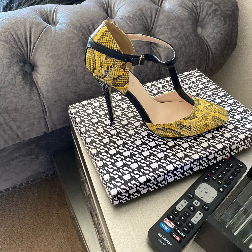 Snake skin high heel shoes